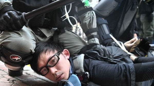 
                              Hong Kong to ban protesters from wearing masks, Carrie Lam confirms
                      