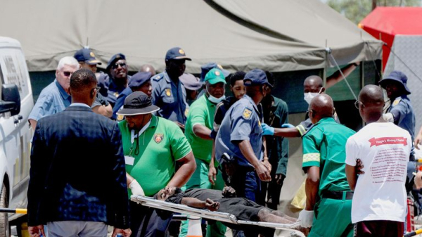Dozens of bodies pulled from illegal South African mine - as 82 survivors face arrest Dozens of bodies pulled from illegal South African mine - as 82 survivors face arrest