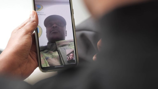 Inside Congolese city overrun by rebels as echoing blasts and crack of bullets force families to hide