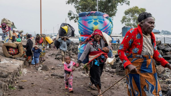 What is the fighting in Democratic Republic of Congo about - and is Rwanda invading?