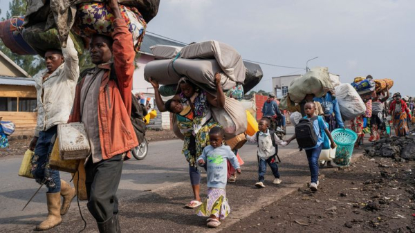 What is the fighting in Democratic Republic of Congo about - and is Rwanda invading?