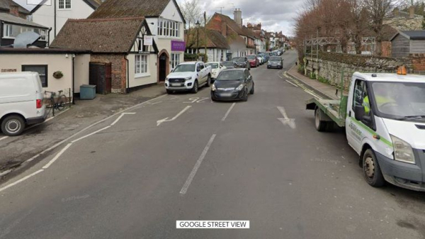 Large sinkhole forces closure of Godstone High Street in Surrey following burst water pipe