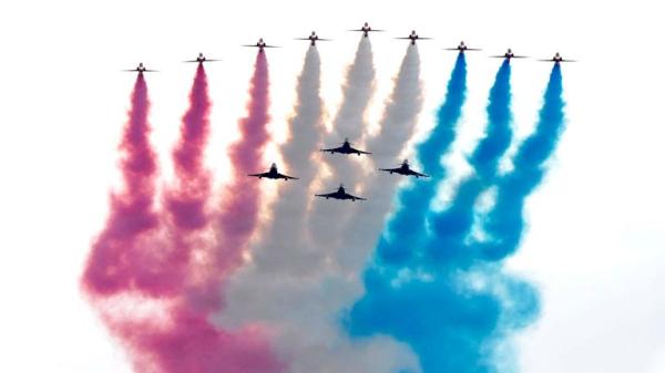 Royal Family watch flypast from Buckingham Palace to mark 80th anniversary of VE Day