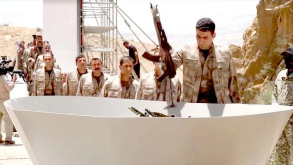 Kurdish fighters burn weapons in significant step towards peace with Turkey Kurdish fighters burn weapons in significant step towards peace with Turkey