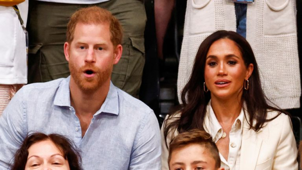 Prince Harry and Meghan cheer as Team UK walks onto Invictus Games opening ceremony stage